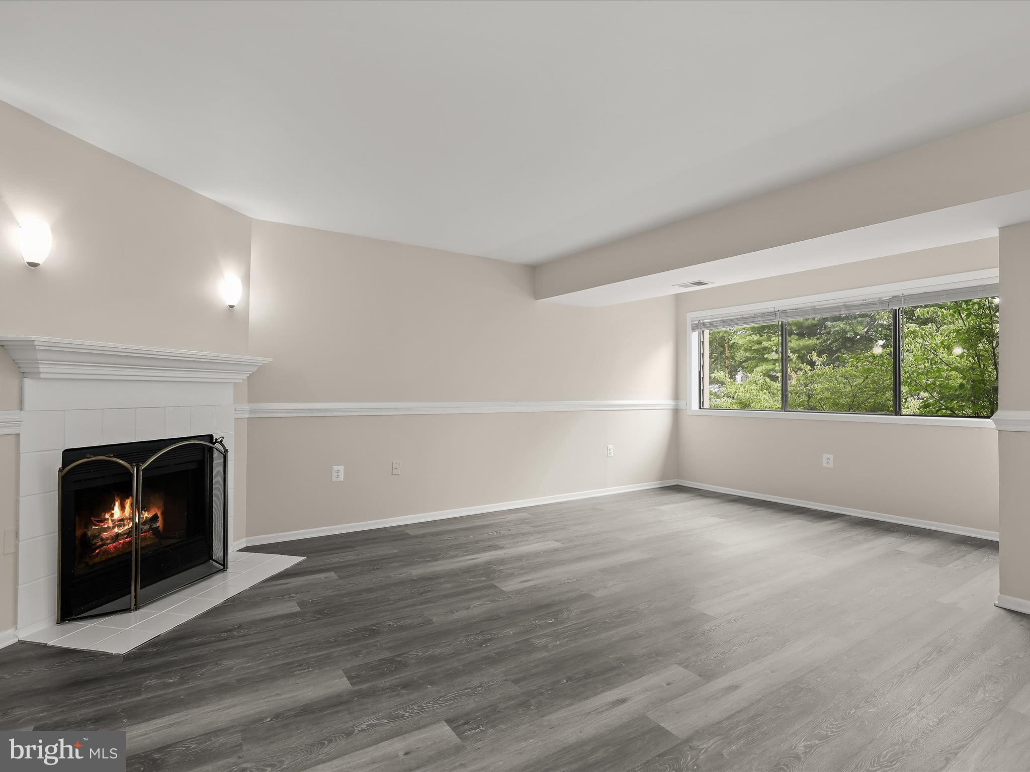 6909 Jones View Drive, Unit 3A Baltimore, MD 21209 - Photo 5 of 42 Living and Dining Rooms