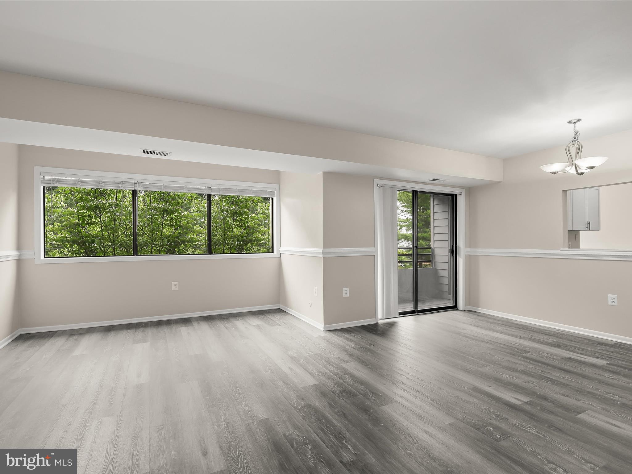 6909 Jones View Drive, Unit 3A Baltimore, MD 21209 - Photo 6 of 42 Living and Dining Rooms