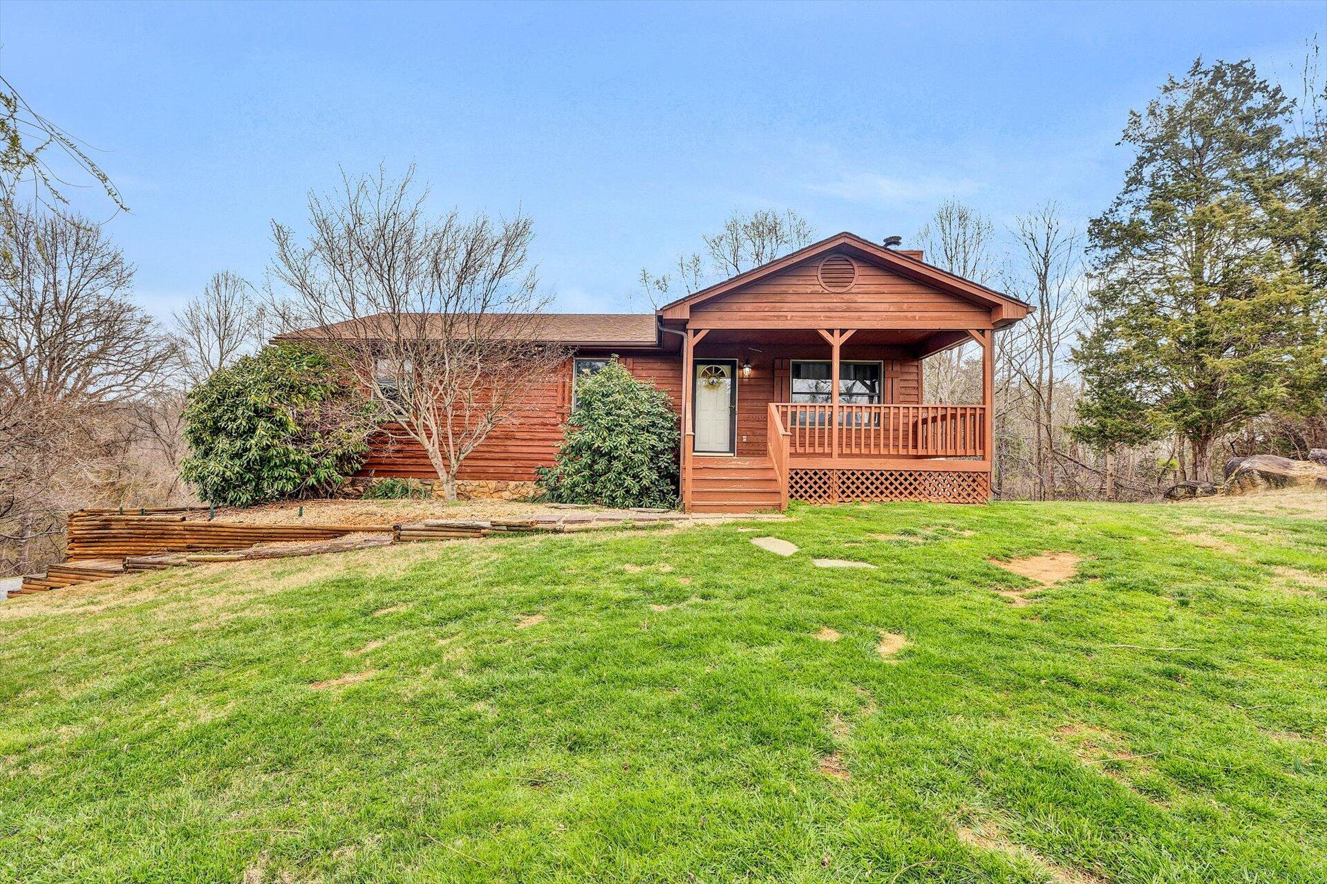 2921 Quarles Road Thaxton, VA 24174 - Photo 1 of 30 a front view of a house with a yard
