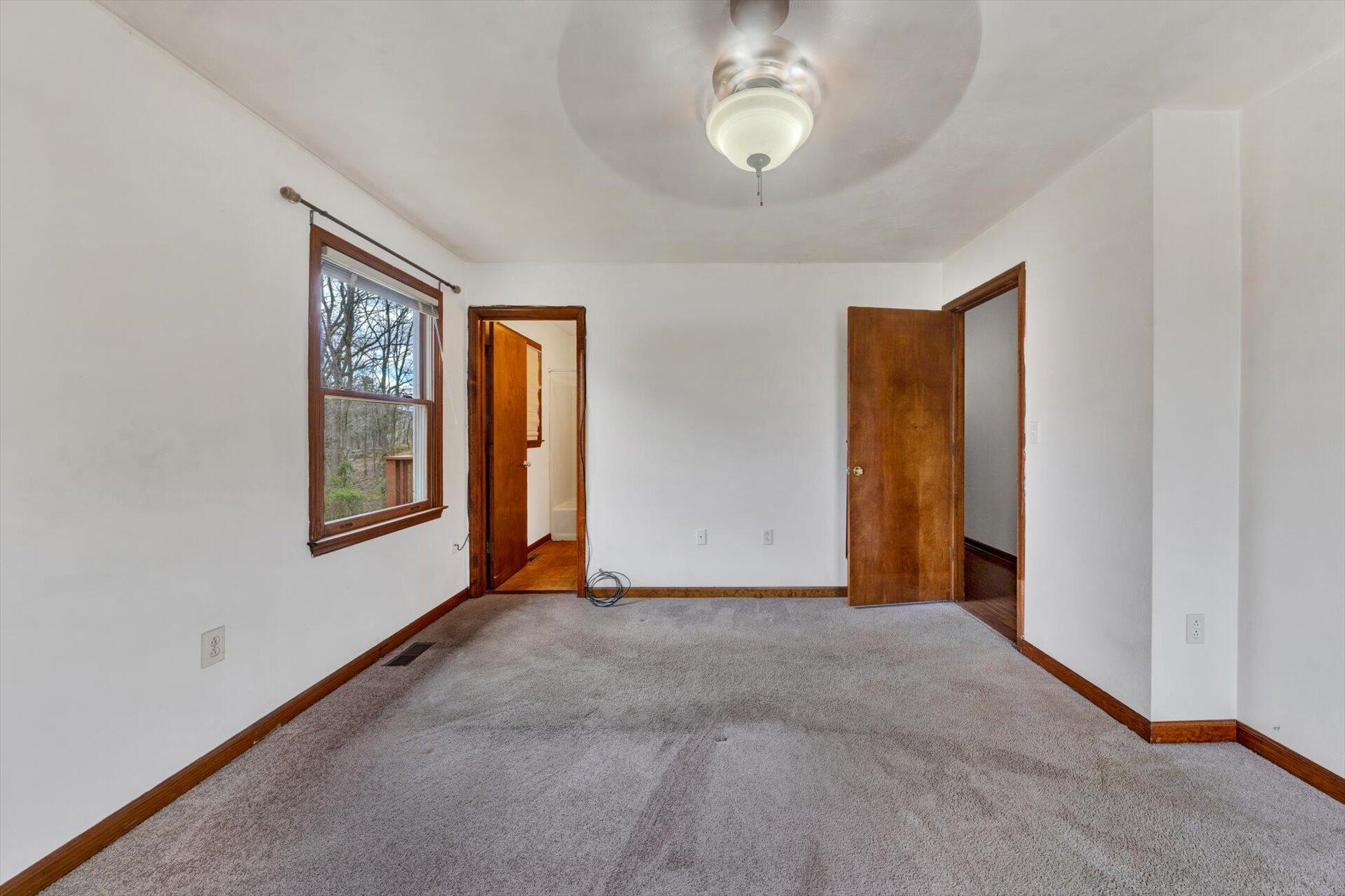 2921 Quarles Road Thaxton, VA 24174 - Photo 20 of 30 a view of an empty room with a window