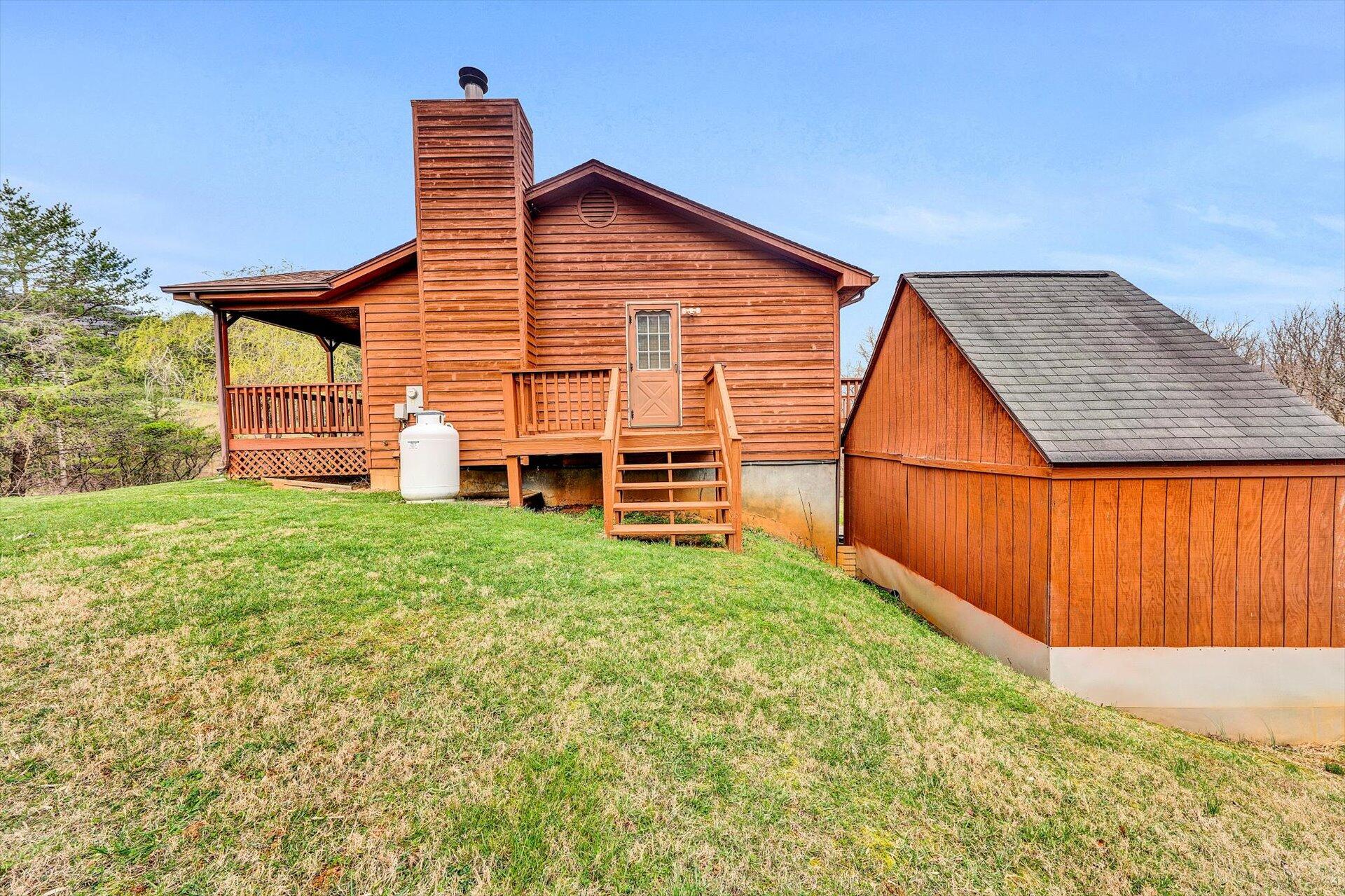2921 Quarles Road Thaxton, VA 24174 - Photo 25 of 30 a view of a backyard with wooden fence