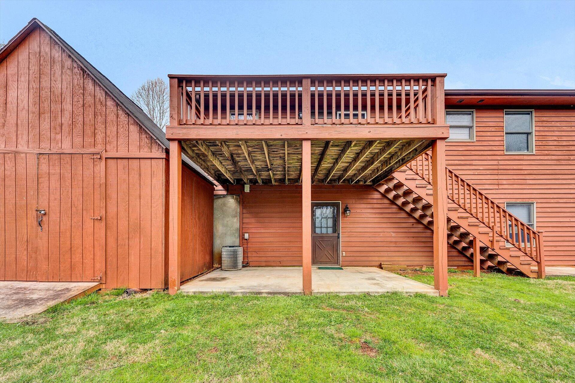 2921 Quarles Road Thaxton, VA 24174 - Photo 28 of 30 a view of a house with wooden deck