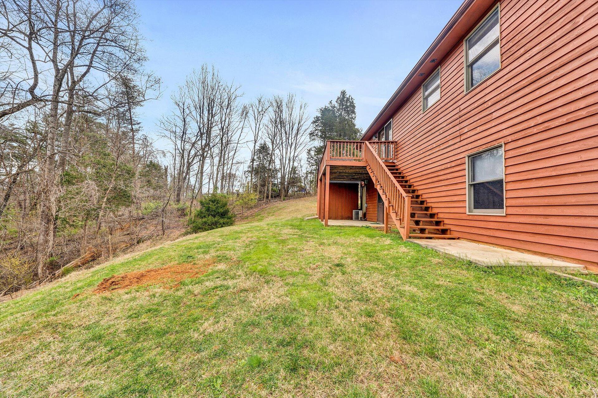 2921 Quarles Road Thaxton, VA 24174 - Photo 29 of 30 a backyard of a house with lots of green space