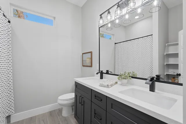 a work room with furniture and a window