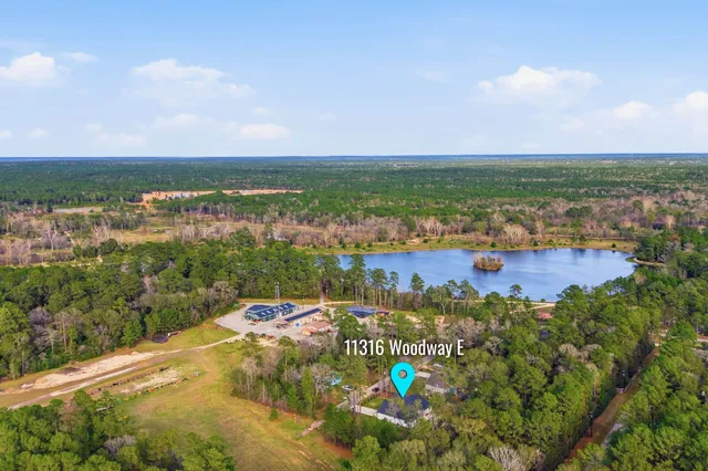 a wooden fence with some plants