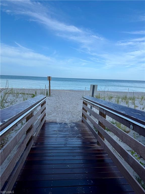 1 Bluebill Avenue, Unit 410 Naples, FL 34108 - Photo 25 of 36 a view of outdoor space with wooden floor and city view