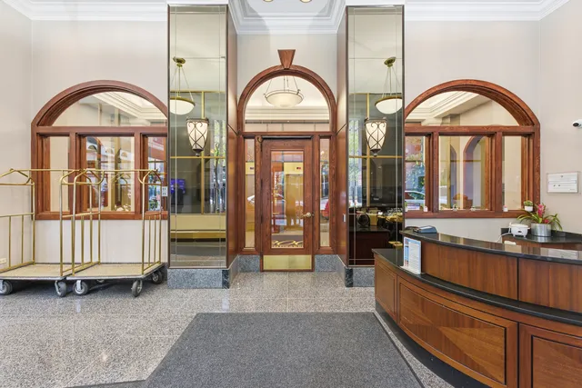 a view of hall way with furniture