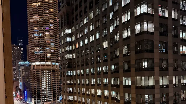 a swimming pool with outdoor seating