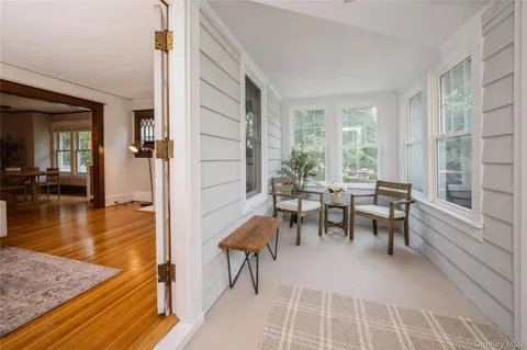 a view of a livingroom with furniture and window