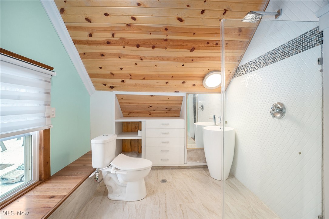 33895 Lorain Road North Ridgeville, OH 44039 - Photo 13 of 24 3rd floor Full bath with vaulted ceiling, wood ceiling, and an enclosed shower