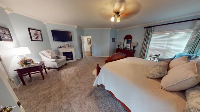 a bedroom with a bed and furniture