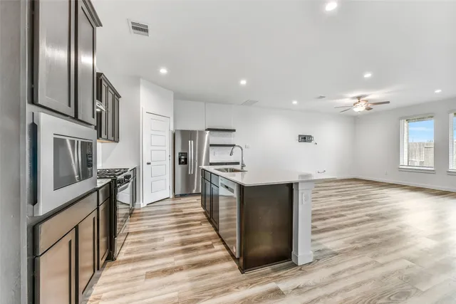 a bathroom with a sink and mirror