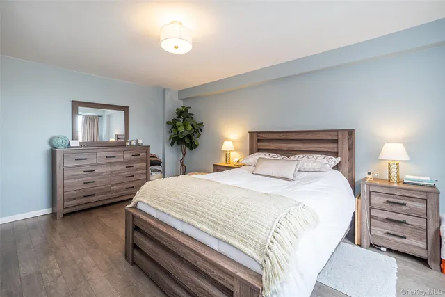 a bathroom with a toilet sink and window