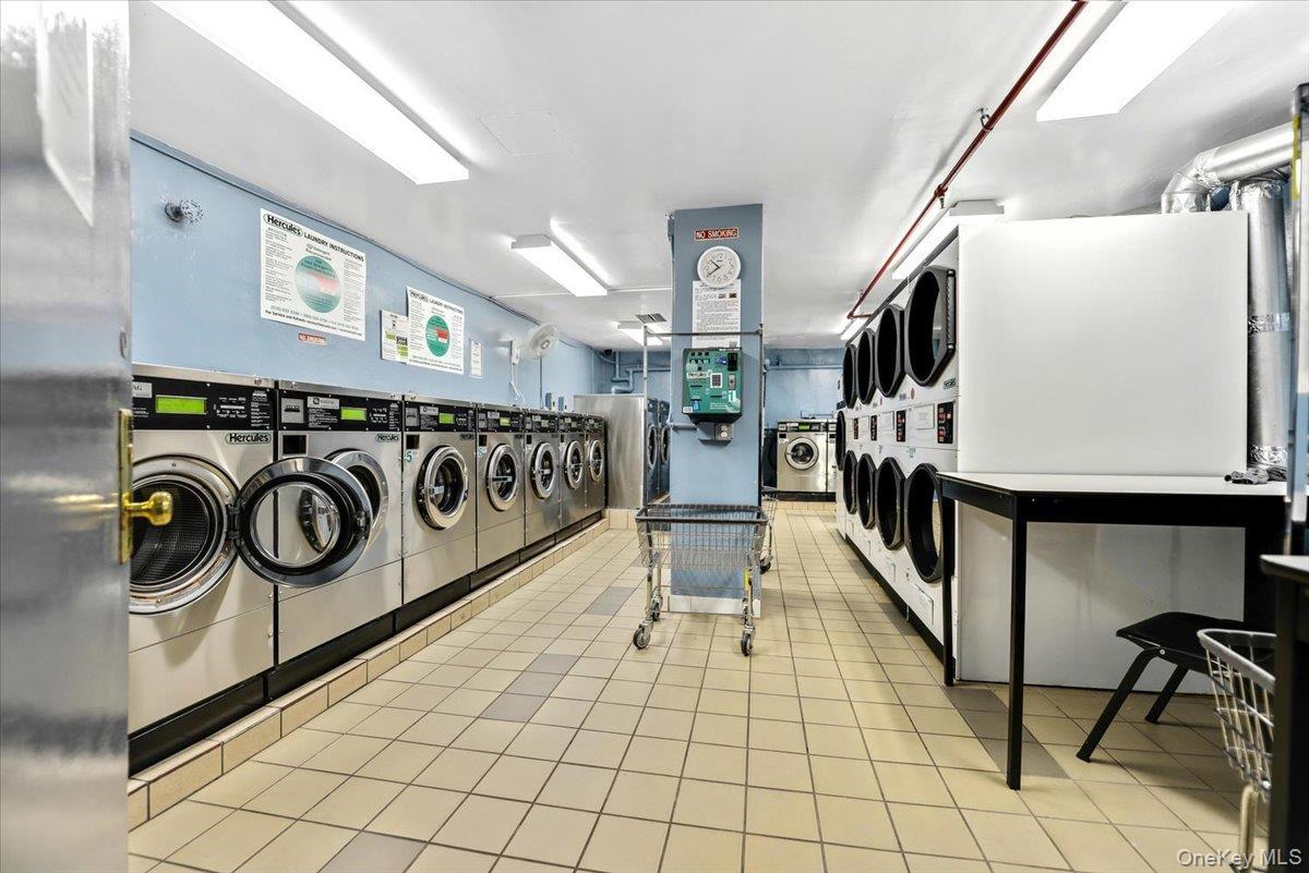 85-15 Main Street, Unit J12 Queens, NY 11435 - Photo 25 of 26 a view of a hallway with wooden floor