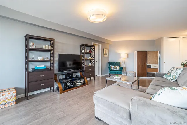 a living room with furniture and a table