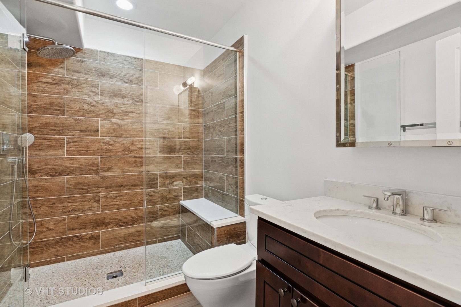 1200 Green Bay Road Glencoe, IL 60022 - Photo 22 of 33 a bathroom with a sink a toilet and shower