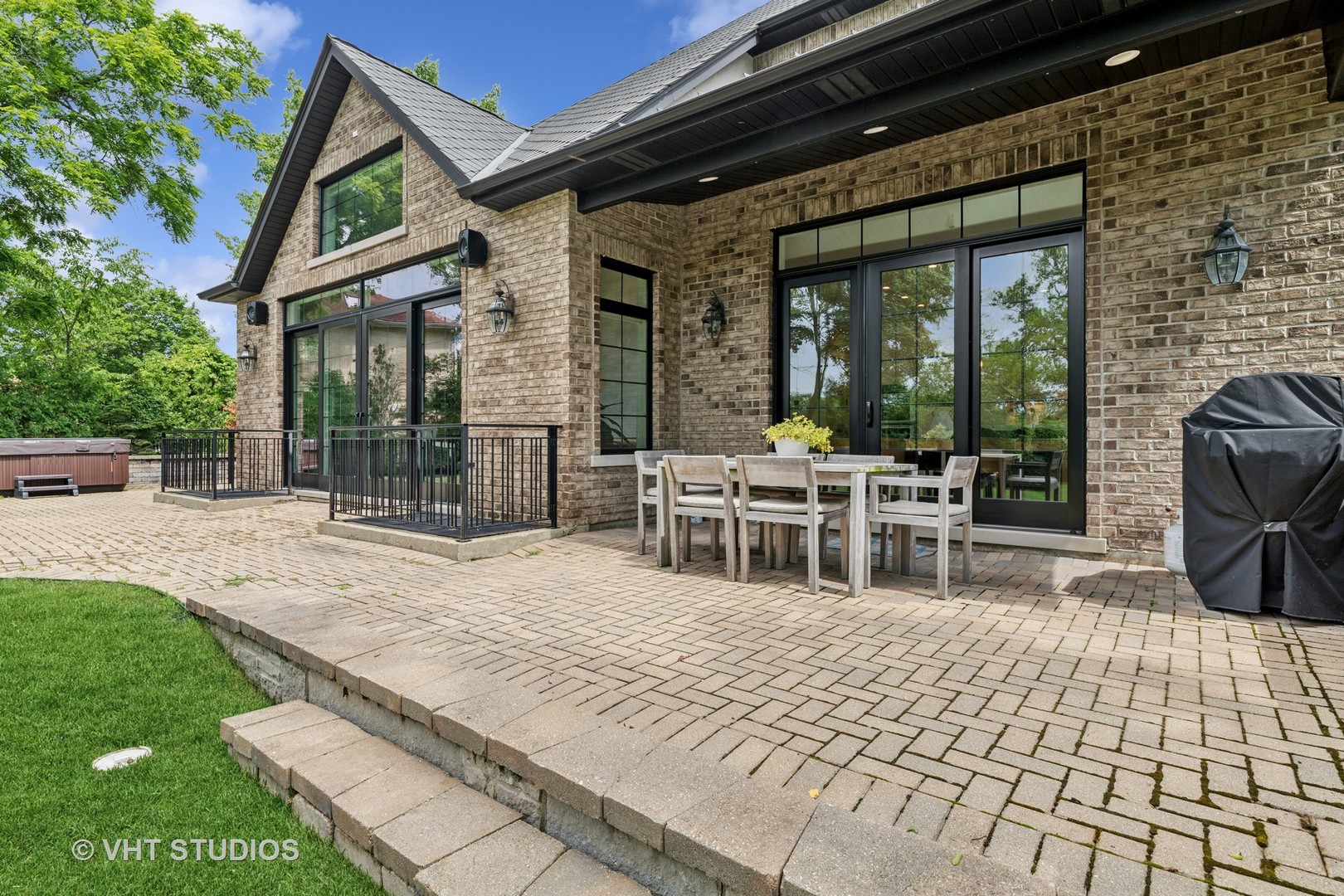 1200 Green Bay Road Glencoe, IL 60022 - Photo 25 of 33 a view of a dinning tables and chairs in the patio