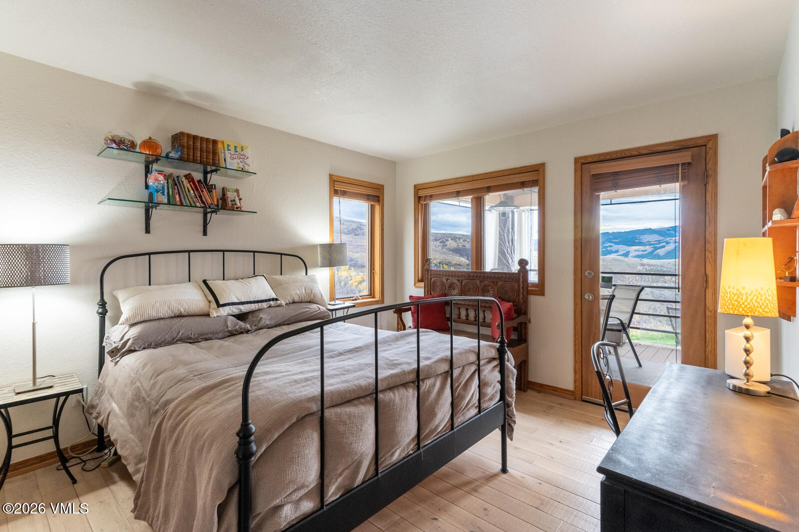 3016 Wildridge Road, Unit 6 Avon, CO 81620 - Photo 21 of 37 a bedroom with a bed and a dresser