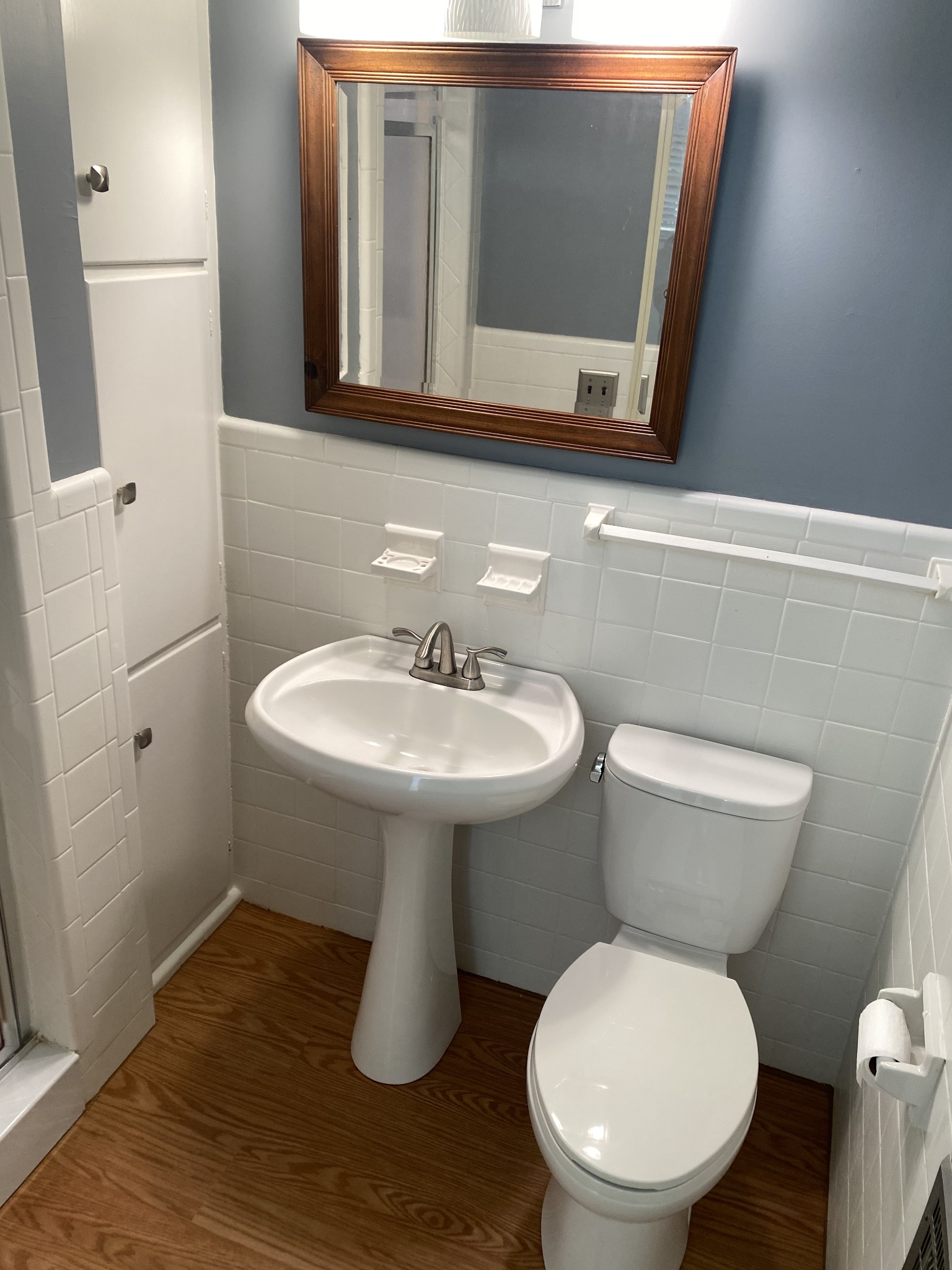 6046 Cargile Road Nashville, TN 37205 - Photo 17 of 24 a bathroom with a toilet sink and mirror