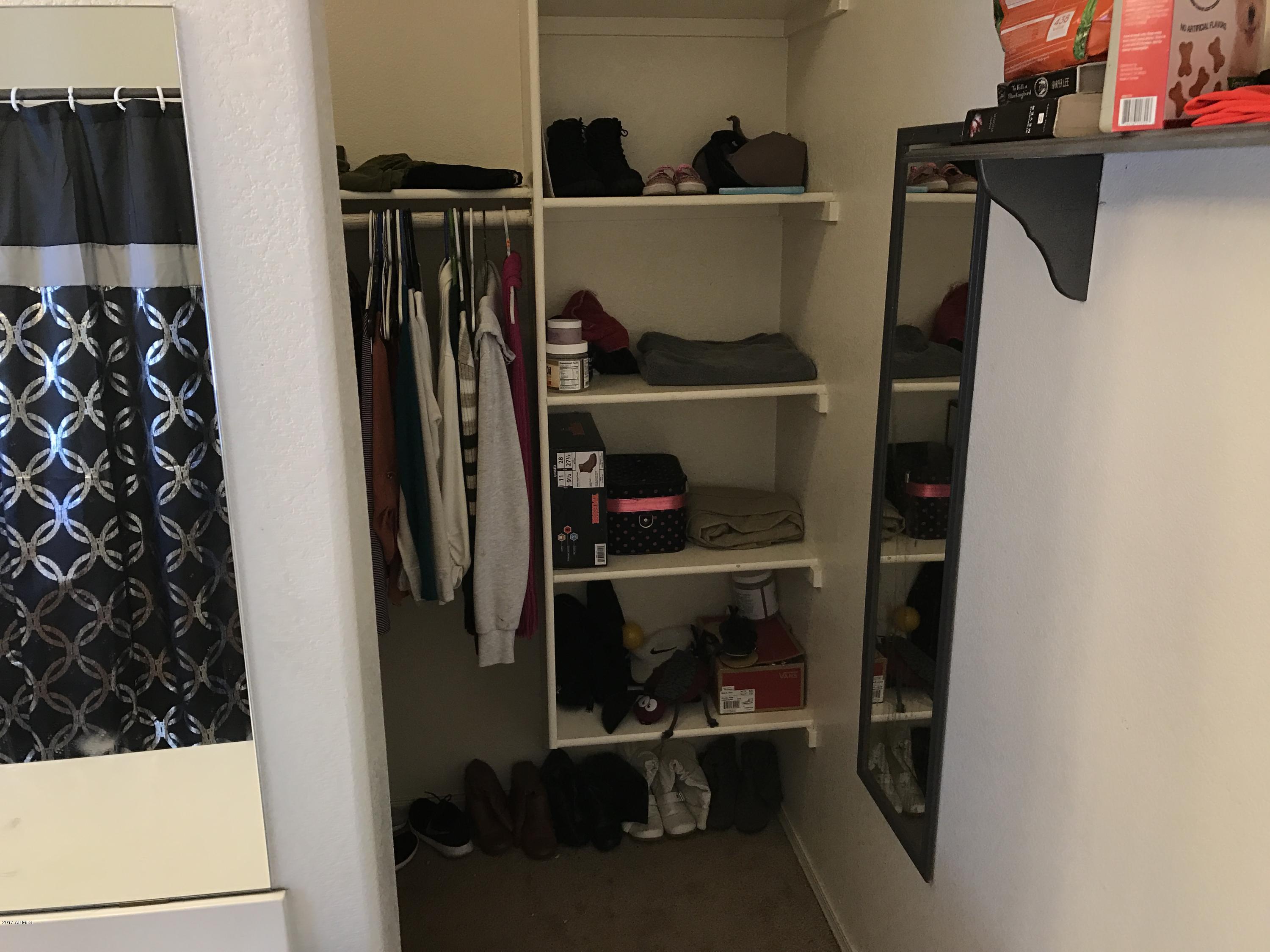 2214 West Vineyard Road Phoenix, AZ 85041 - Photo 16 of 19 Master walk in closet