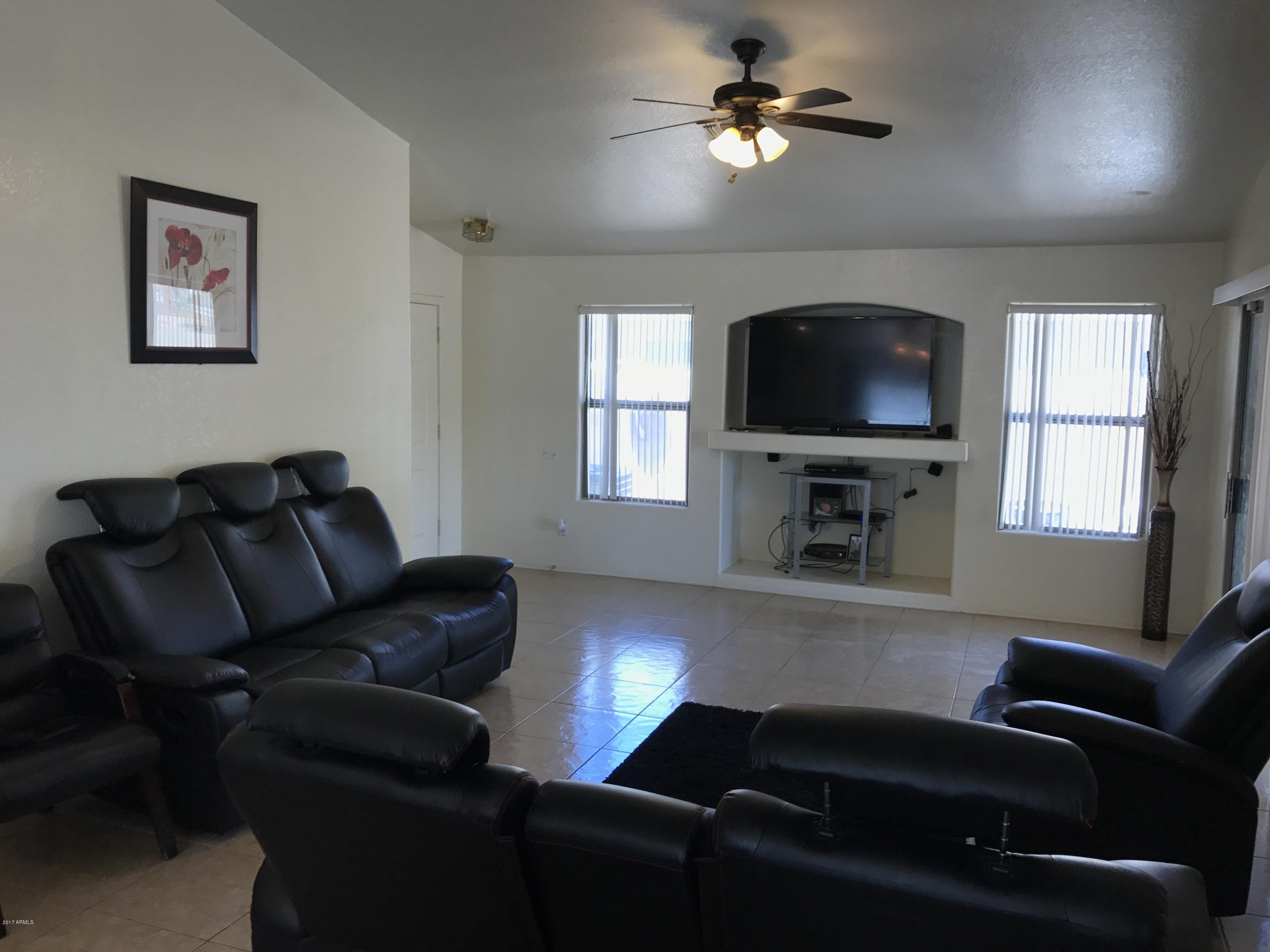 2214 West Vineyard Road Phoenix, AZ 85041 - Photo 3 of 19 Living room