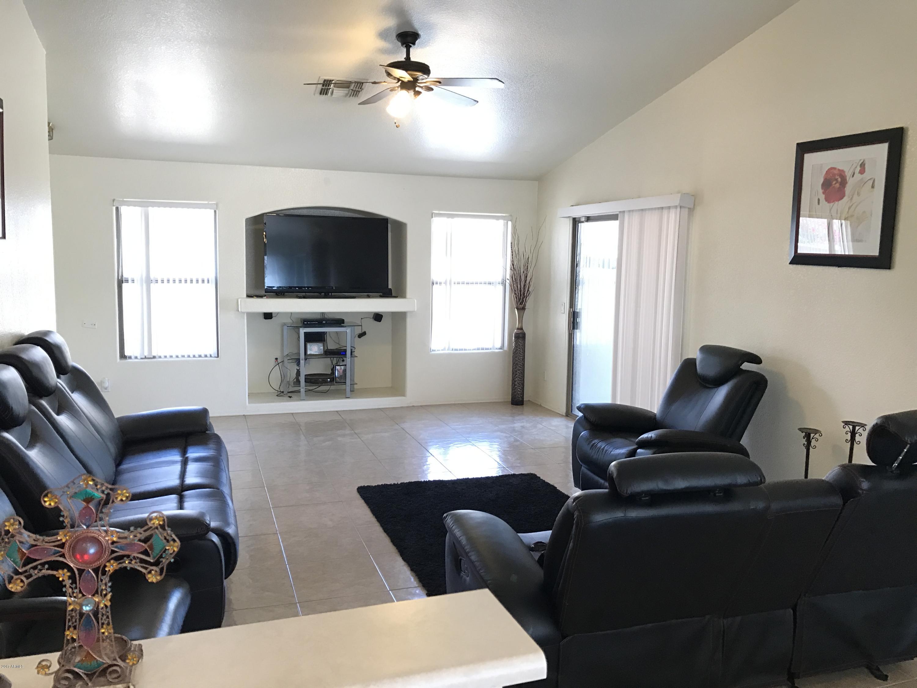 2214 West Vineyard Road Phoenix, AZ 85041 - Photo 4 of 19 IMG_1432
