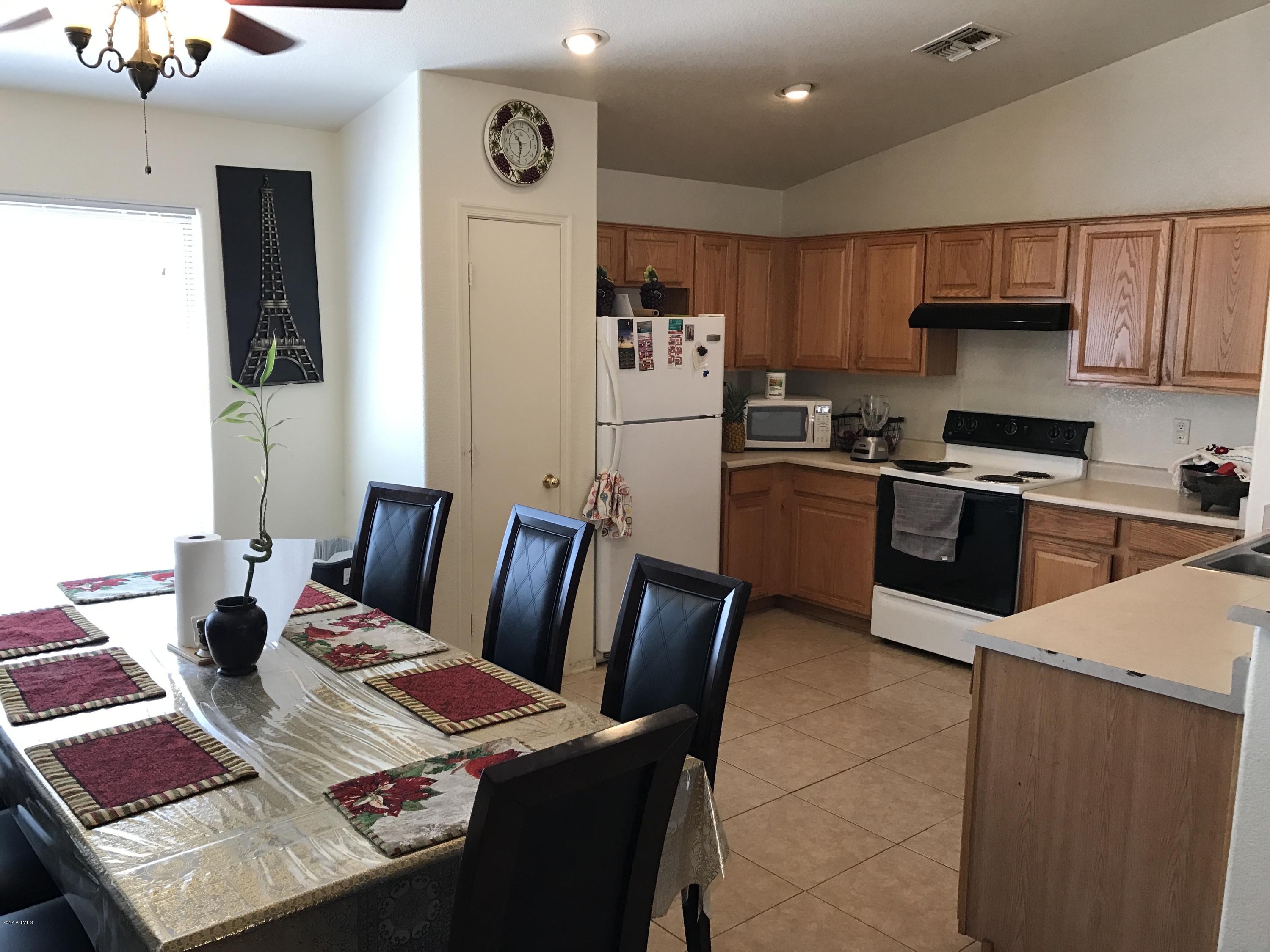 2214 West Vineyard Road Phoenix, AZ 85041 - Photo 6 of 19 IMG_1442