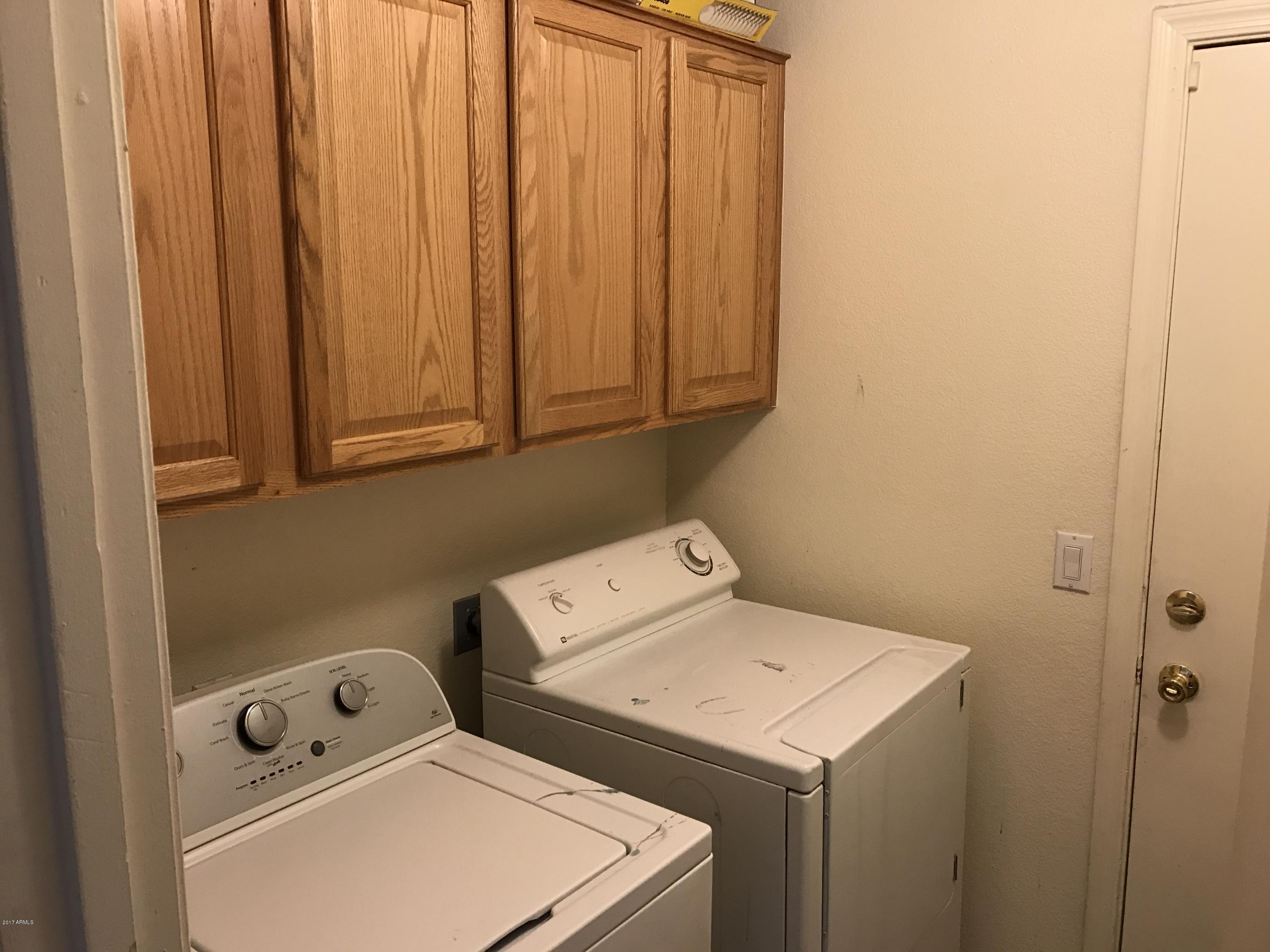 2214 West Vineyard Road Phoenix, AZ 85041 - Photo 10 of 19 Laundry room