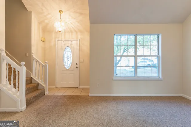 an empty room with windows