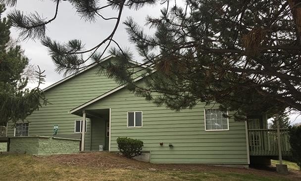 242 Southwest 3rd Street Madras, OR 97741 - Photo 4 of 7 a view of a backyard