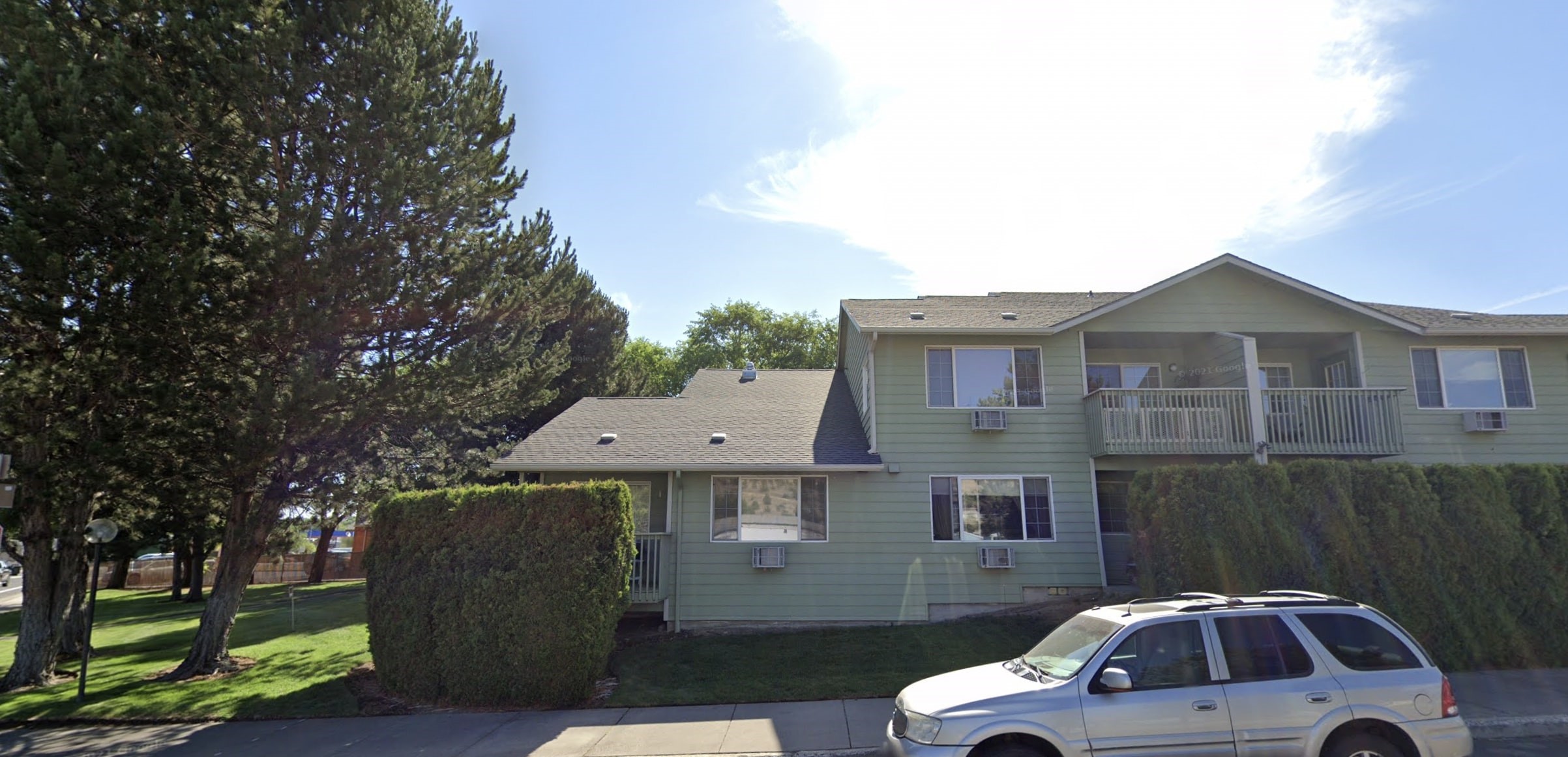 242 Southwest 3rd Street Madras, OR 97741 - Photo 5 of 7 a view of a car parked in front of a house