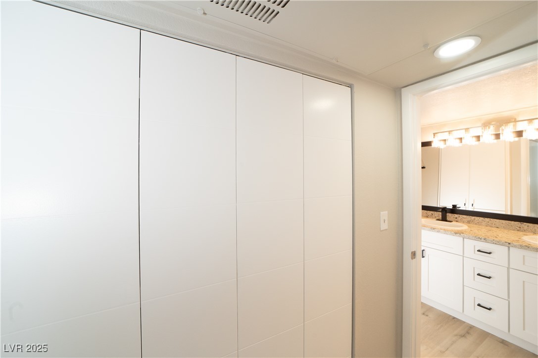8101 West Flamingo Road, Unit 1057 Las Vegas, NV 89147 - Photo 14 of 38 Closet featuring a sink