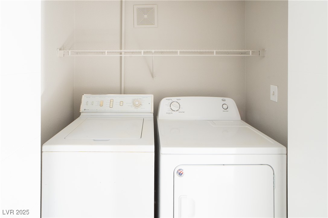 8101 West Flamingo Road, Unit 1057 Las Vegas, NV 89147 - Photo 15 of 38 Laundry area featuring separate washer and dryer