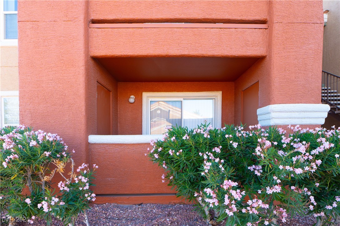 8101 West Flamingo Road, Unit 1057 Las Vegas, NV 89147 - Photo 27 of 38 Entrance to property with stucco siding