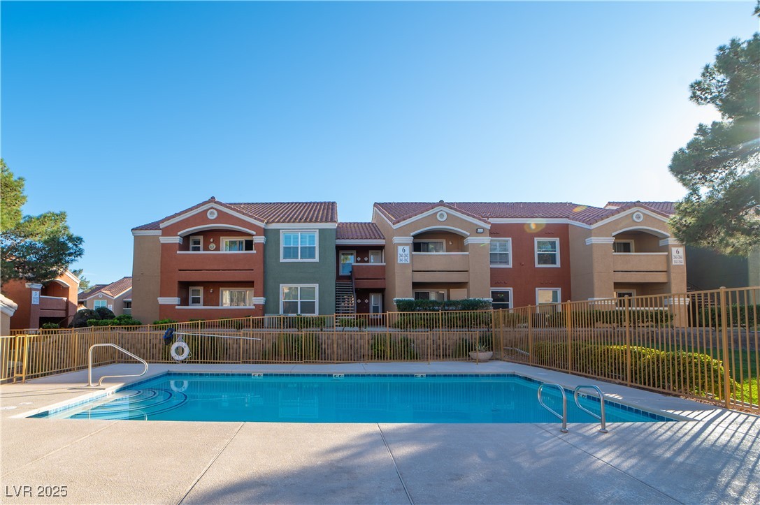 8101 West Flamingo Road, Unit 1057 Las Vegas, NV 89147 - Photo 35 of 38 Community pool with a patio