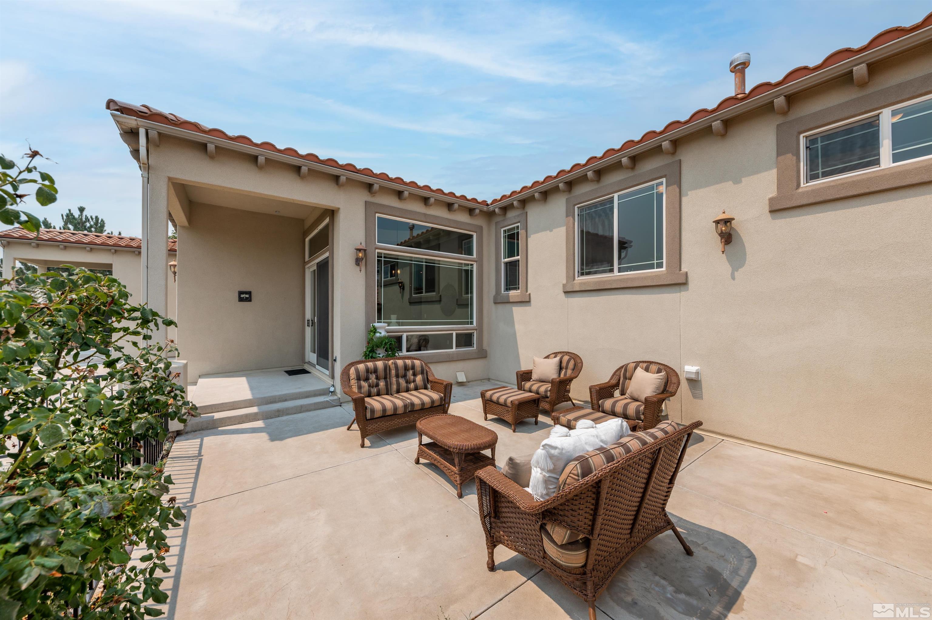 12880 Silver Wolf Road Reno, NV 89511 - Photo 23 of 35 a house view with a seating space