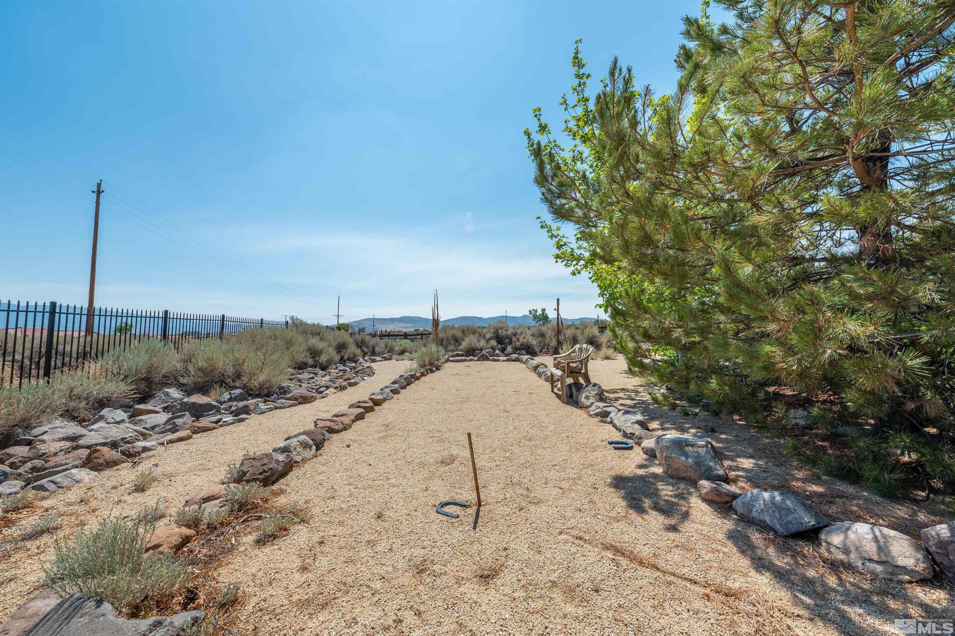 12880 Silver Wolf Road Reno, NV 89511 - Photo 30 of 35 a view of a backyard of a house