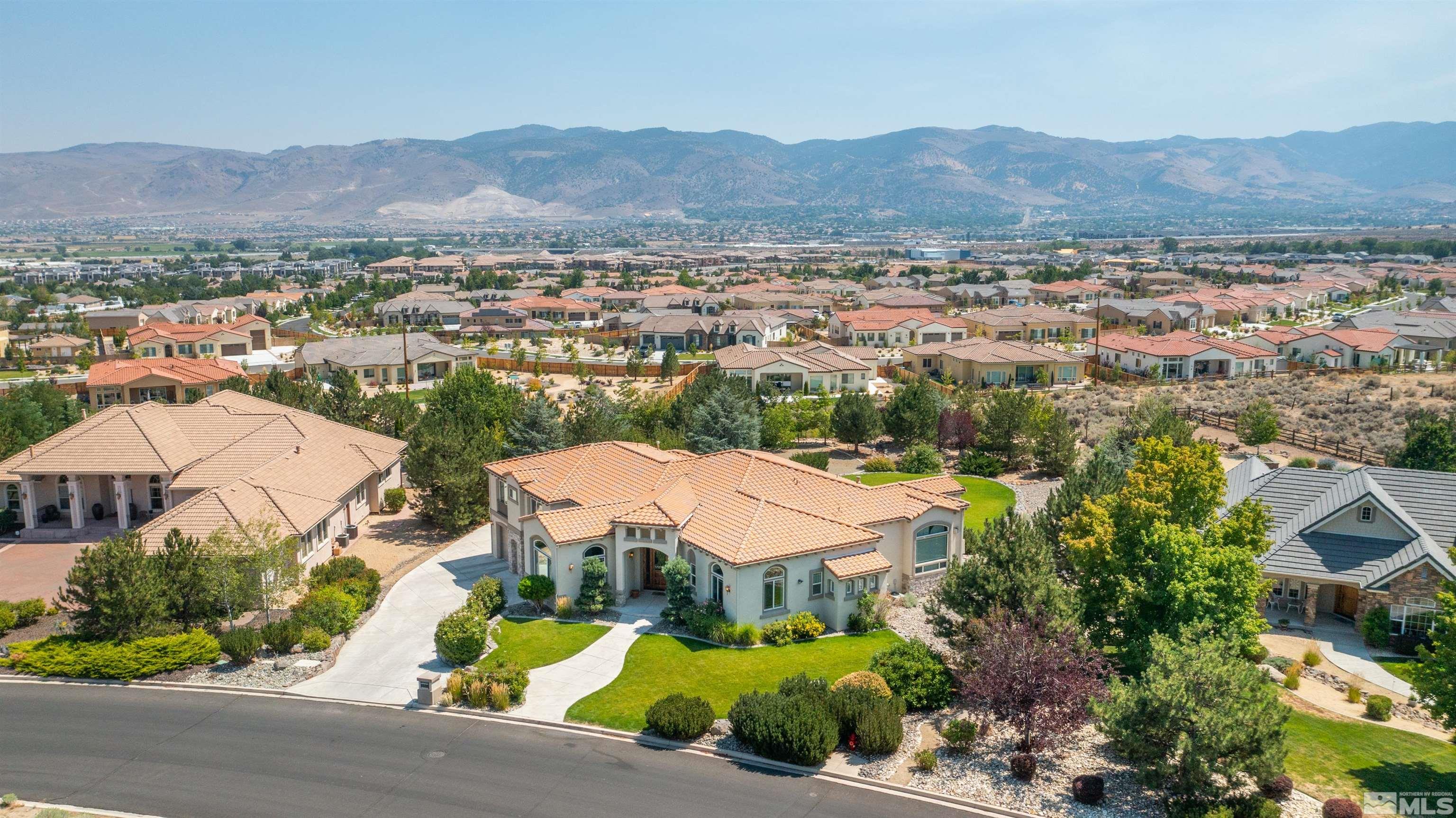 12880 Silver Wolf Road Reno, NV 89511 - Photo 32 of 35 an aerial view of residential houses and trees