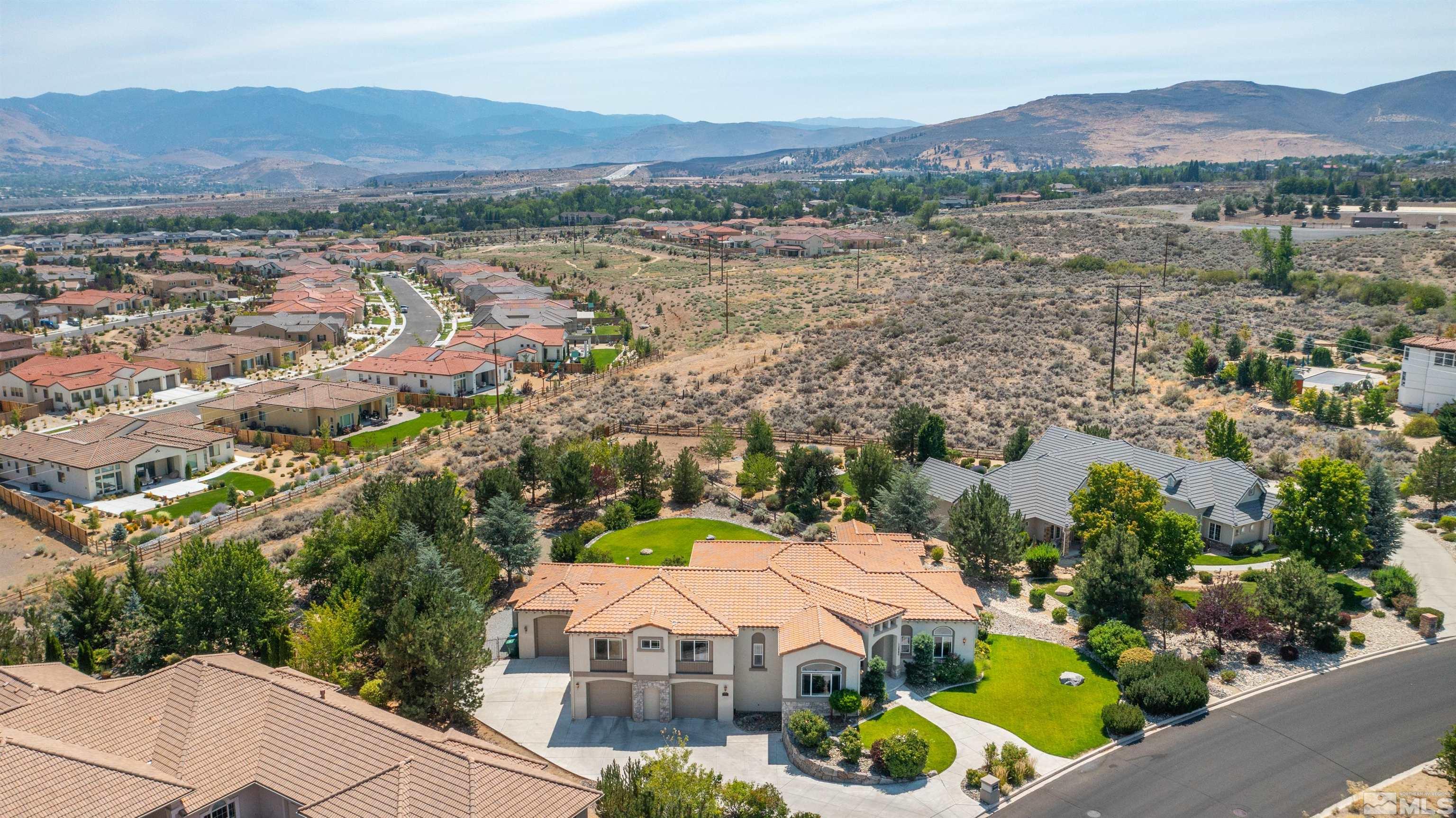 12880 Silver Wolf Road Reno, NV 89511 - Photo 35 of 35 an aerial view of residential houses and outdoor space