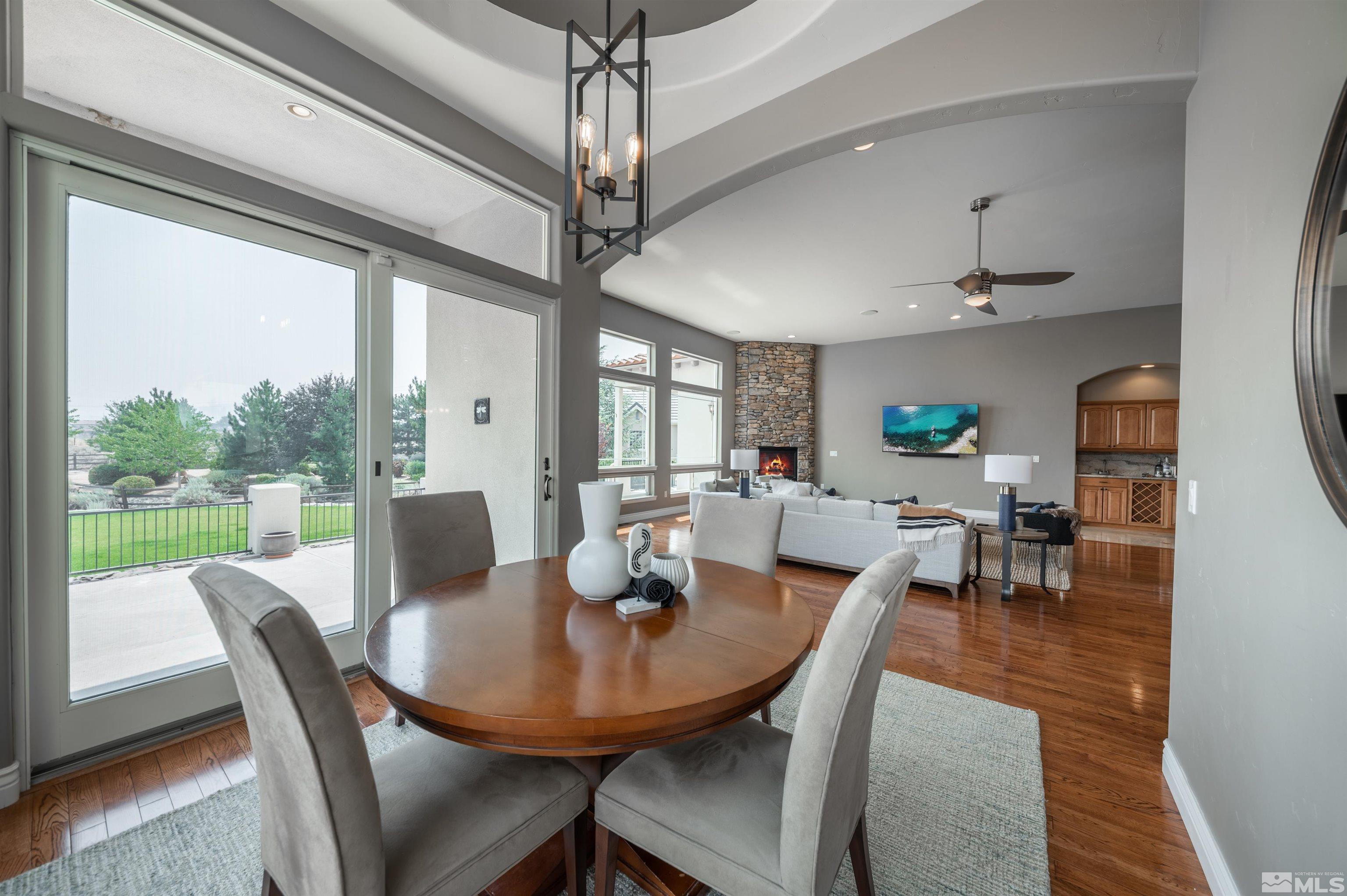 12880 Silver Wolf Road Reno, NV 89511 - Photo 7 of 35 a view of a dining room with furniture window and outside view