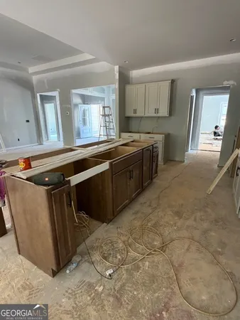 a bathroom with a double vanity sink and mirror