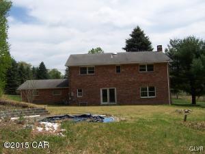 55 Turkey Ridge Kunkletown, PA 18058 - Photo 8 of 9 a front view of a house with a garden