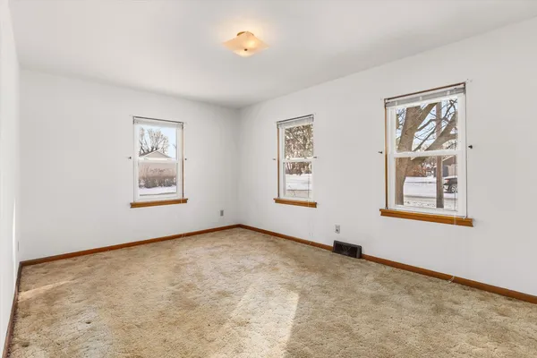 an empty room with window