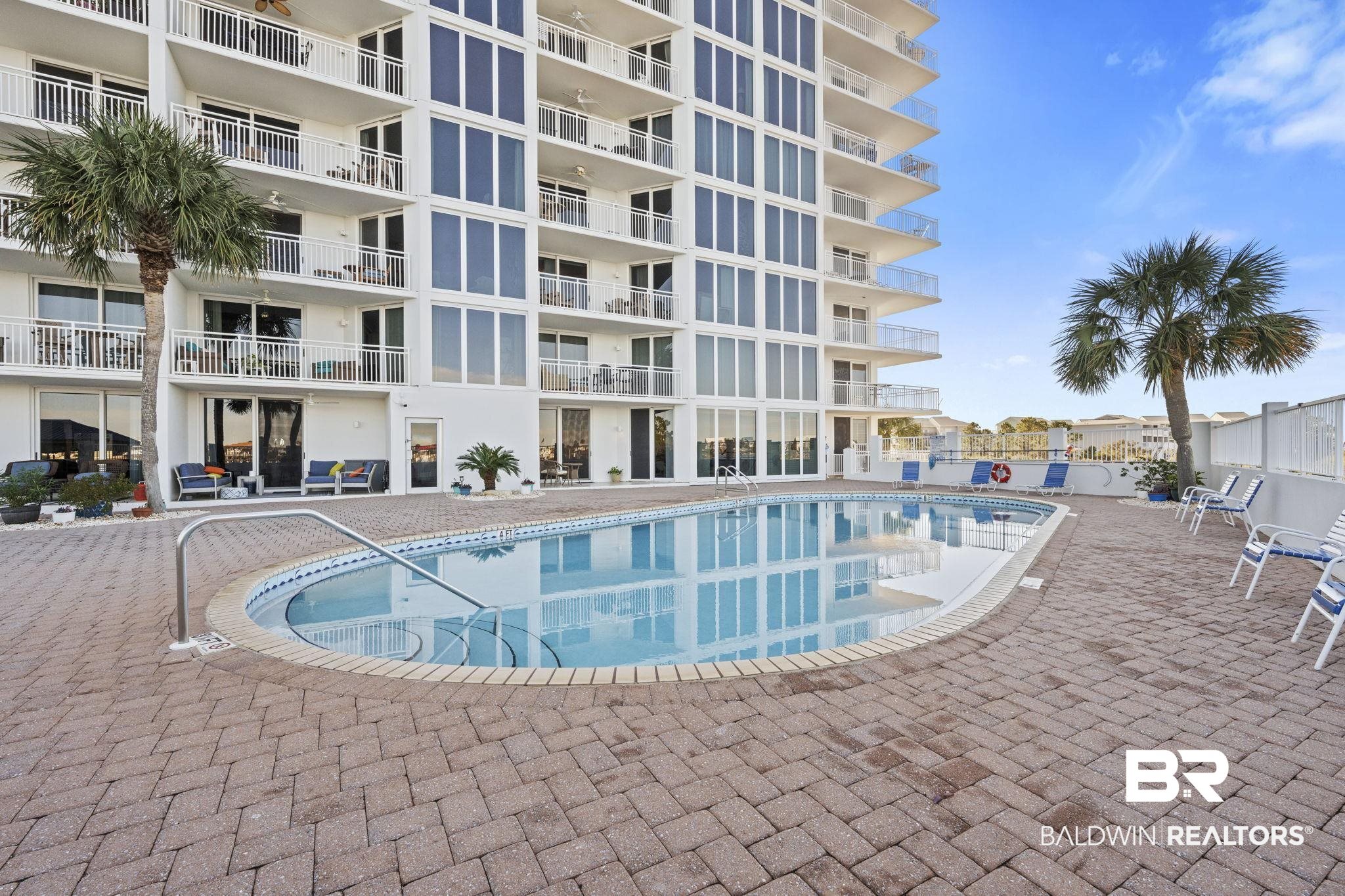 16284 Perdido Key Drive, Unit 912 Perdido Key, FL 32507 - Photo 42 of 49 Community pool with a patio area