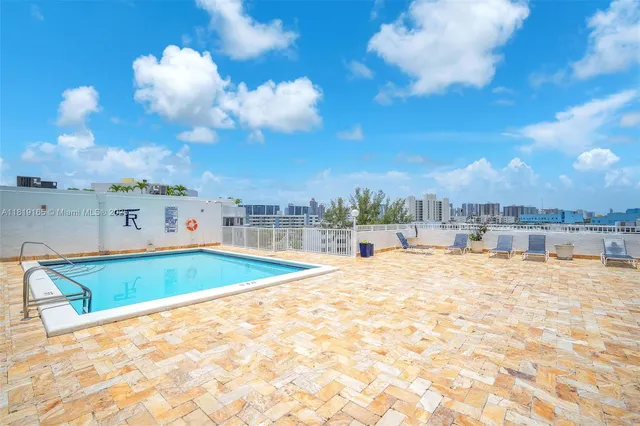 a front view of a building with outdoor space