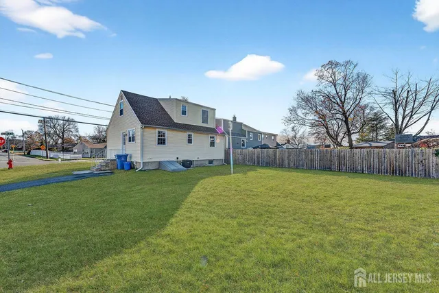 a bathroom with a sink and a yard