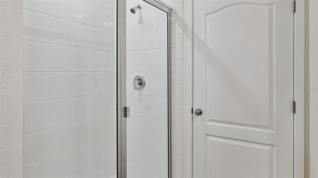 1024 Commons Way Port Port Orange, FL 32129 - Photo 12 of 17 a bathroom with a shower