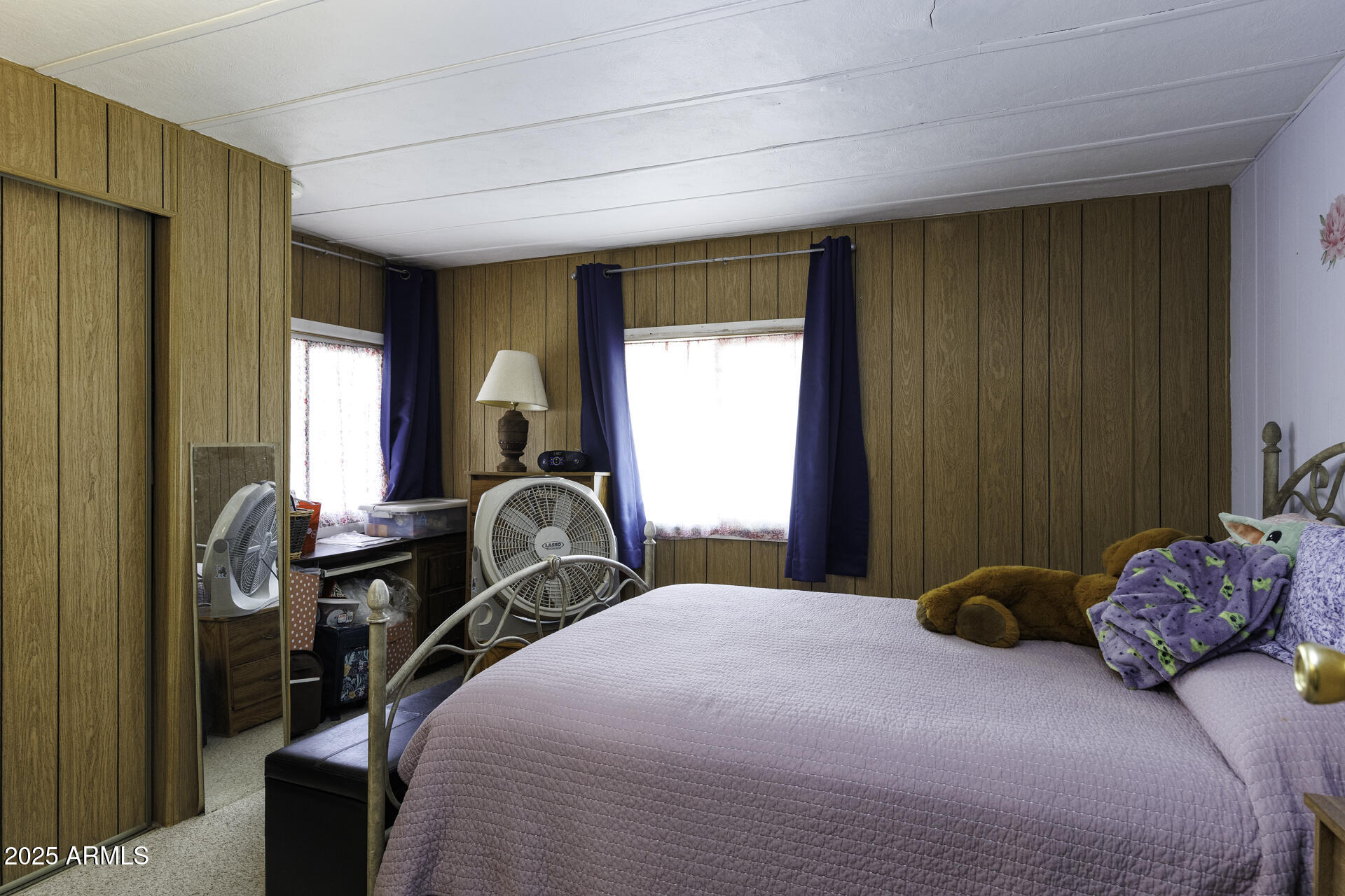 2100 North Trekell Road, Unit 347 Casa Grande, AZ 85122 - Photo 14 of 38 a bedroom with a bed and a window