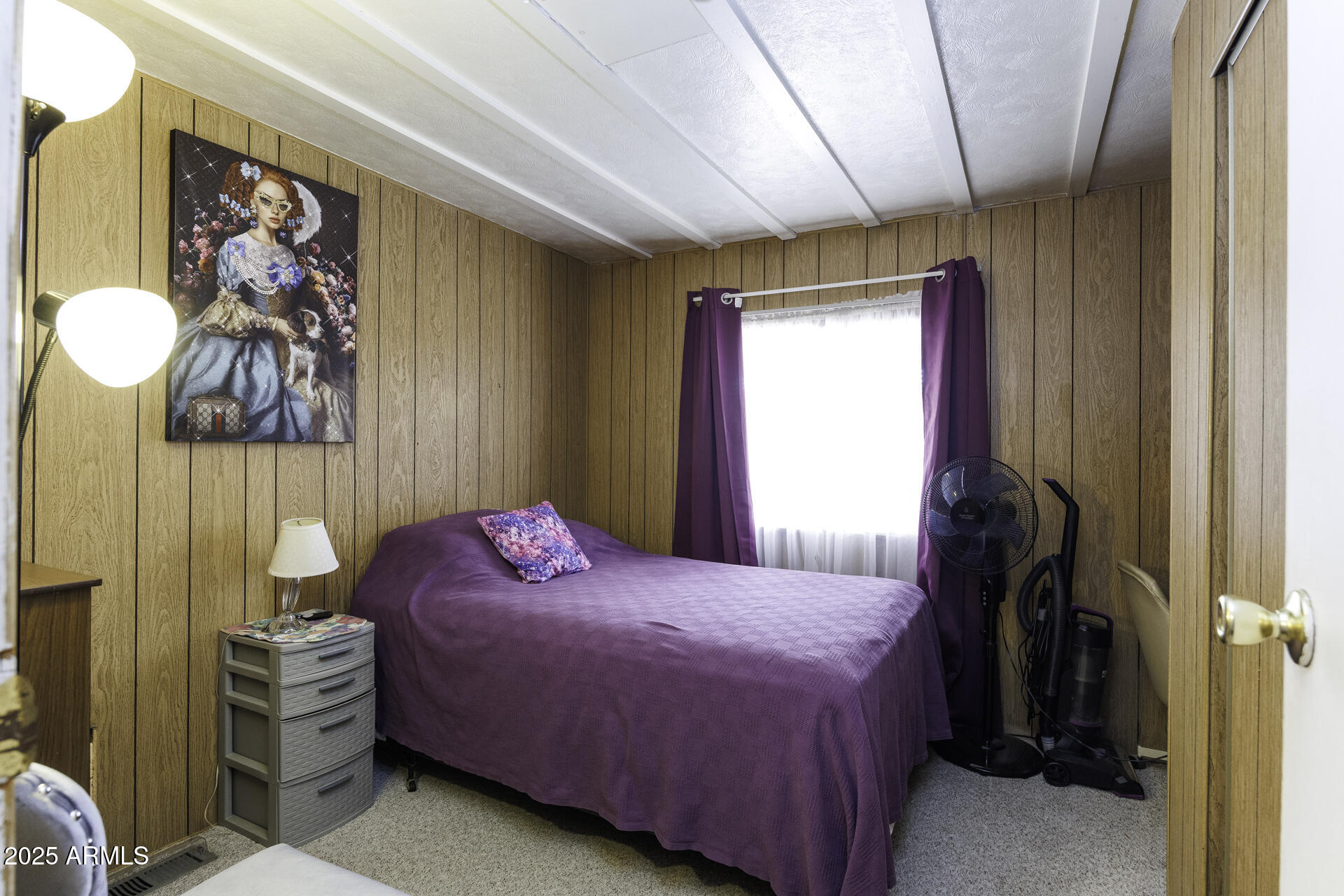 2100 North Trekell Road, Unit 347 Casa Grande, AZ 85122 - Photo 17 of 38 a bedroom with a bed and a painting on the wall