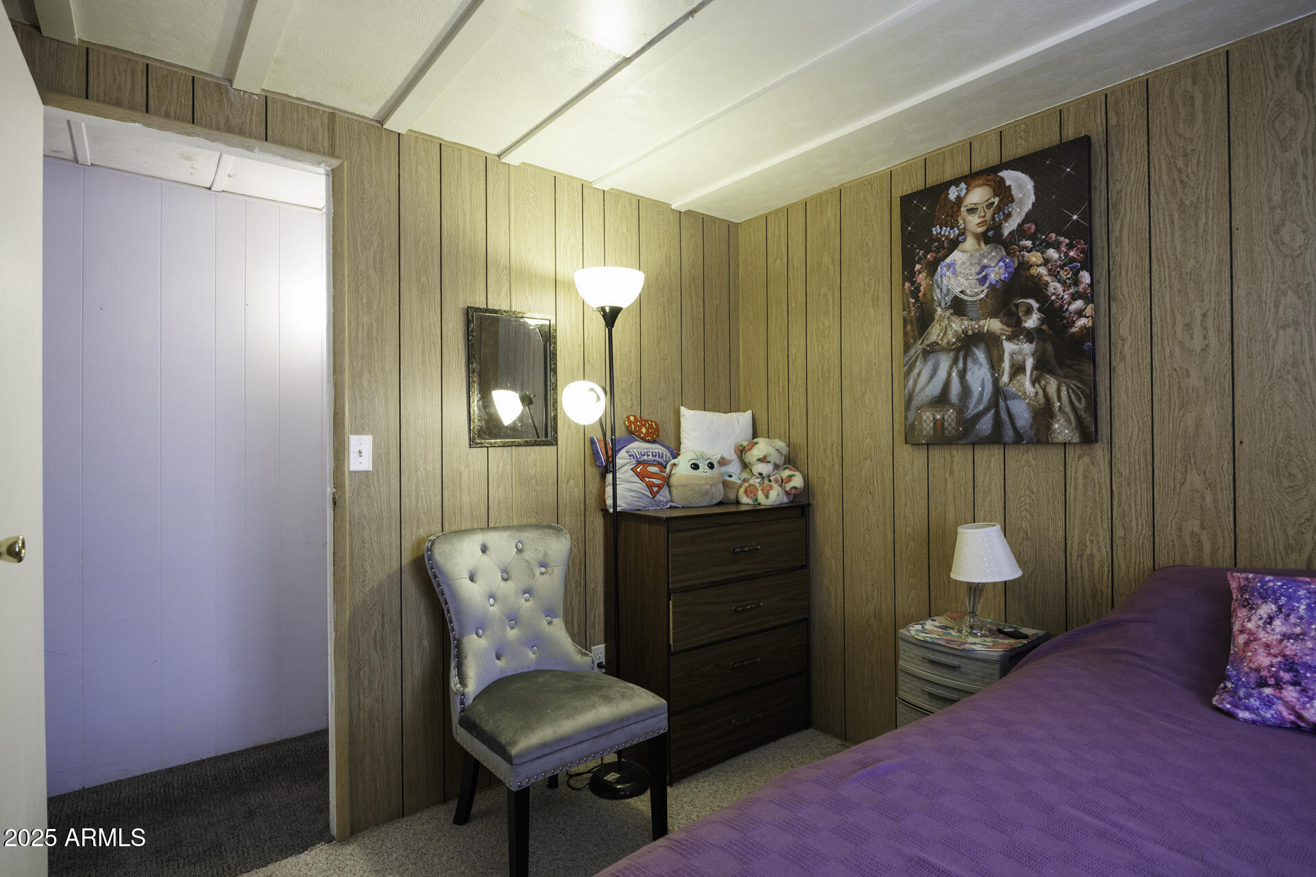 2100 North Trekell Road, Unit 347 Casa Grande, AZ 85122 - Photo 18 of 38 a bedroom with a bed and a painting on the wall